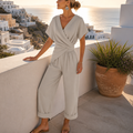 SolaraLuxe™ – Wrap-Front Wide-Leg Jumpsuit with Twist Waist